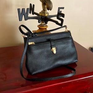 Brand new Michael Kors purse. Tag still present.